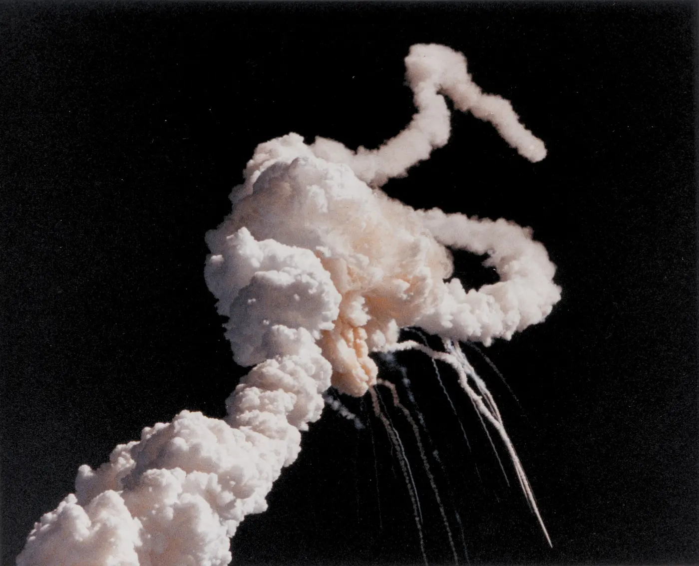 Smoke trails in the sky after Space Shuttle Challenger broke apart, 28 January 1986